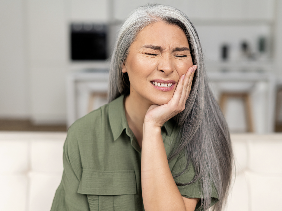 A woman with a dental emergency
