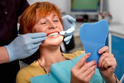woman getting all-on-4 dental implants long beach ca