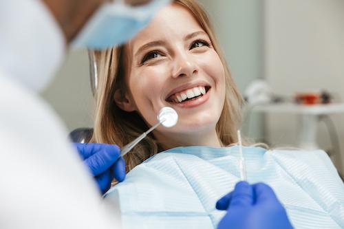 woman availing general dentistry long beach ca