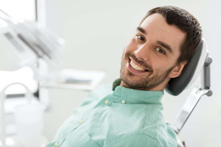 A smiling man in the dentist's chair | Long Beach dentist