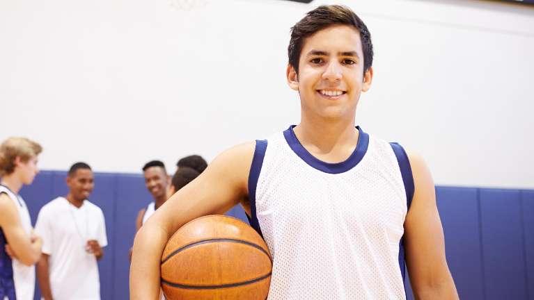 A smiling man at the gym | knocked out tooth Long Beach