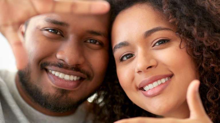 A smiling couple | jaw misalignment Long Beach CA