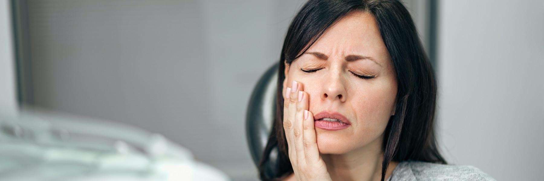 woman getting a root canal treatment | Long Beach