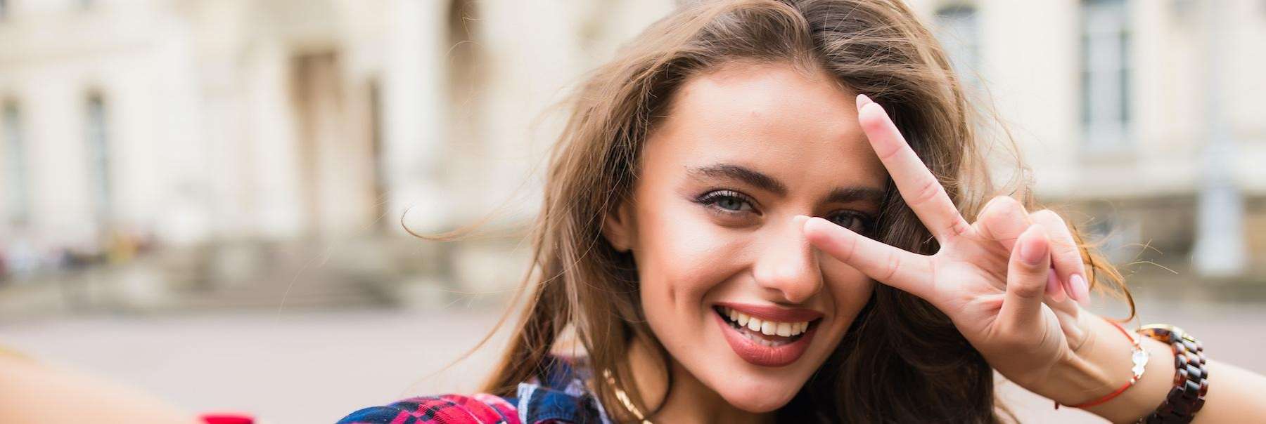 girl smiling after tooth extraction long beach ca