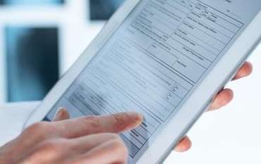 Image of dental records on a tablet